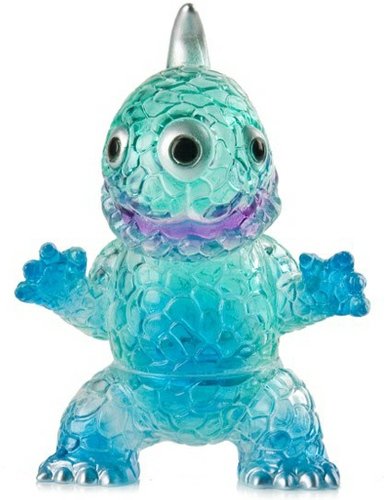 Crouching Miborah - Clear Blue figure, produced by Gargamel. Front view.