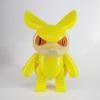 Snout: Strangeco Yellow figure by Touma, produced by Headlock Studio. Front view.