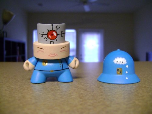 The Dream Police figure by Noneg. Front view.