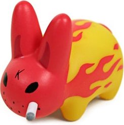 Smorkin Labbit - Flames figure by Frank Kozik, produced by Kidrobot. Front view.
