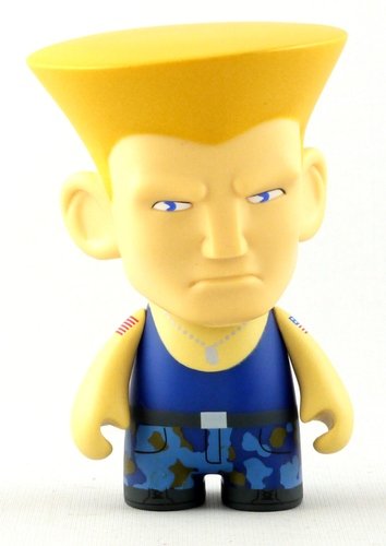 Guile - Blue figure by Capcom, produced by Kidrobot X Capcom. Front view.