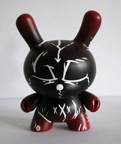 Mitosis Dunny figure by Ardabus Rubber, produced by Kidrobot. Front view.