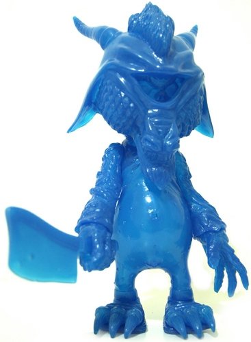 Mishka x Cure Boogie Man - Unpainted GID Blue figure by Cure Toys X Mishka, produced by Cure Toys. Front view.