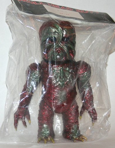 Bio X figure, produced by Skull Head Butt. Front view.