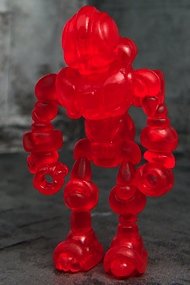 Buildman Gendrone Clear Red figure, produced by Onell Design. Front view.