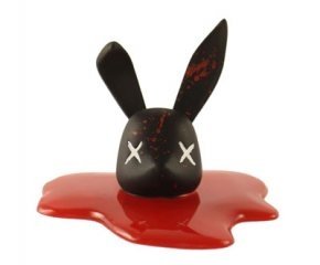 Decapitated Bunny Head - Black and Splattered SDCC  figure by Luke Chueh, produced by Munky King. Front view.
