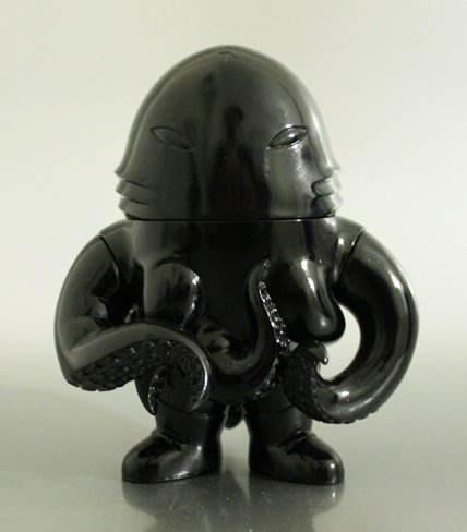 Squirm figure by Brian Flynn, produced by Super7. Front view.