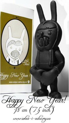 Happy New Year - Black figure by Solya And Asha. Front view.