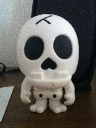 Baby Milo (B)one figure by Bape, produced by Bape Play. Front view.