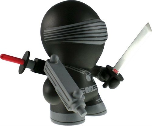 Snake Eyes figure by Les Schettkoe, produced by The Loyal Subjects. Front view.