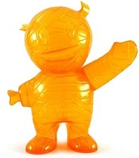 Mummy Boy - Clear Orange Unpainted figure by Brian Flynn, produced by Super7. Front view.