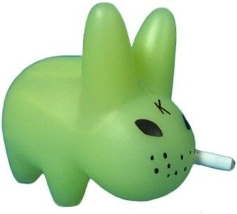Glowing Labbit figure by Frank Kozik, produced by Kidrobot. Front view.