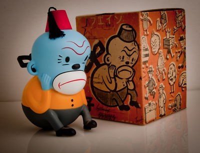 Toy Monkey figure by Gary Taxali, produced by Chump Toys. Packaging.