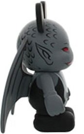 Winged Demon figure by Casey Jones, produced by Disney. Side view.