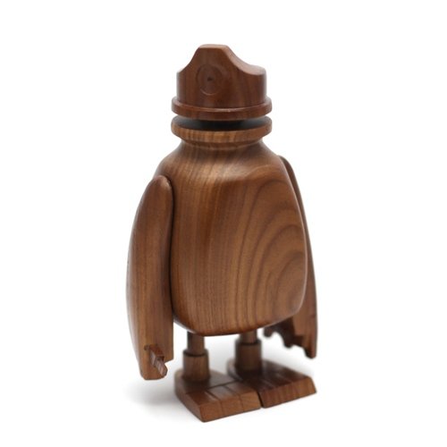 Wooden Bodega figure by Kano, produced by Knocks On Wood. Front view.