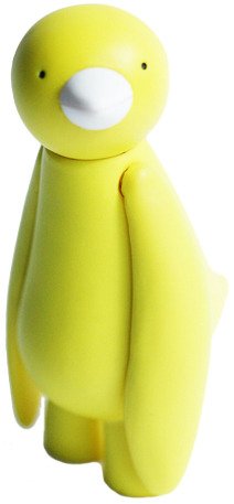 Yellow Ji Ja Bird figure by Mr. Clement. Front view.
